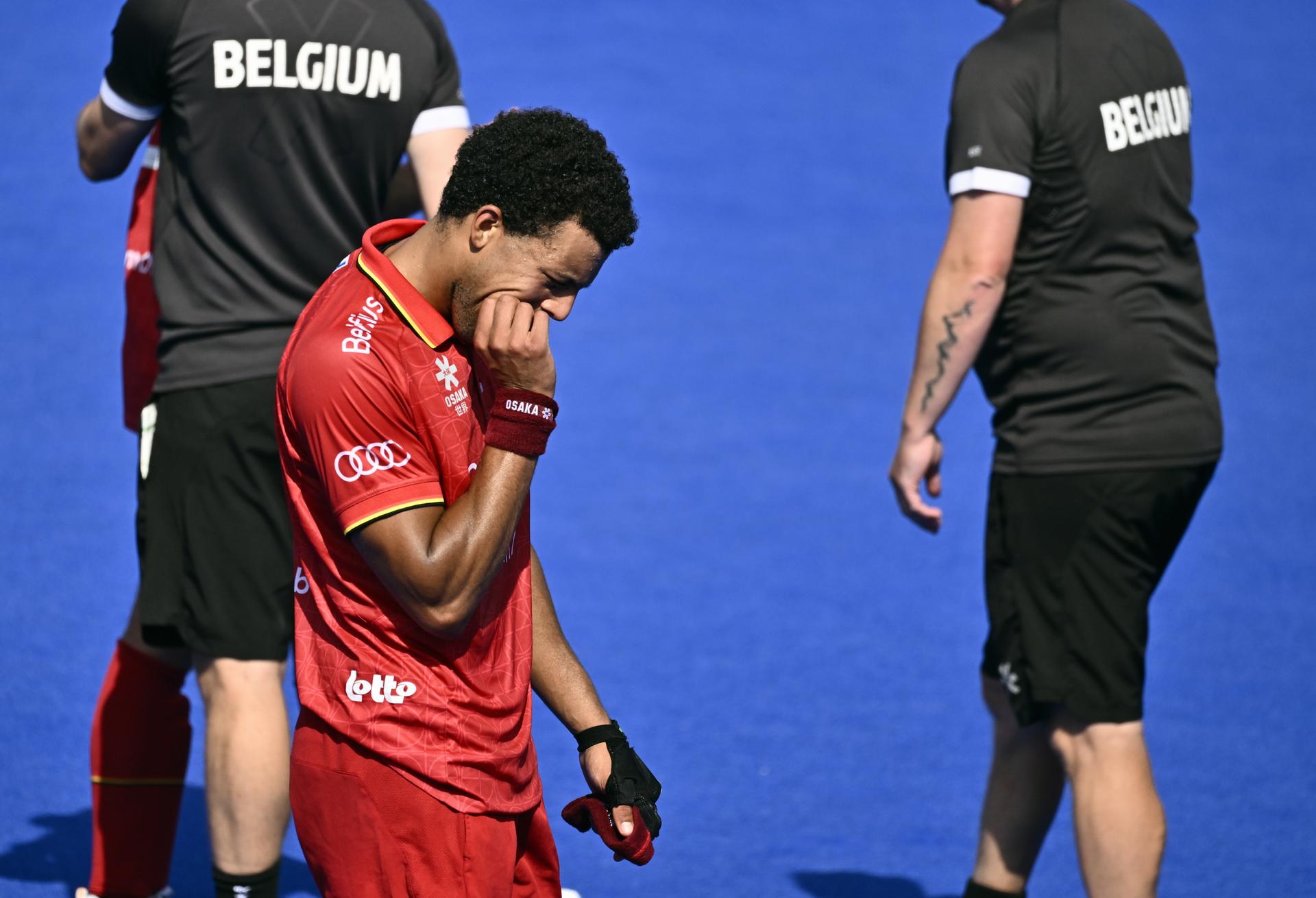 Belgium's Nelson Onana looks dejected after losing a hockey game between Spain and the Belgian national team Red Lions, match 3/3 in the pool stage of the 2025 men's European championships, Tuesday 12 August 2025 in Monchengladbach, Germany. BELGA PHOTO ERIC LALMAND