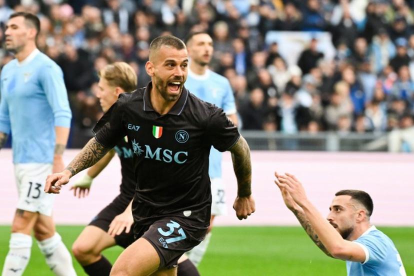 Napoli's Italian defender #37 Leonardo Spinazzola (C) celebrates after scoring his team first goal during the Italian Serie A football match between Lazio and Napoli at The Olympic Stadium in Rome on January 4, 2026.  Alberto PIZZOLI / AFP
