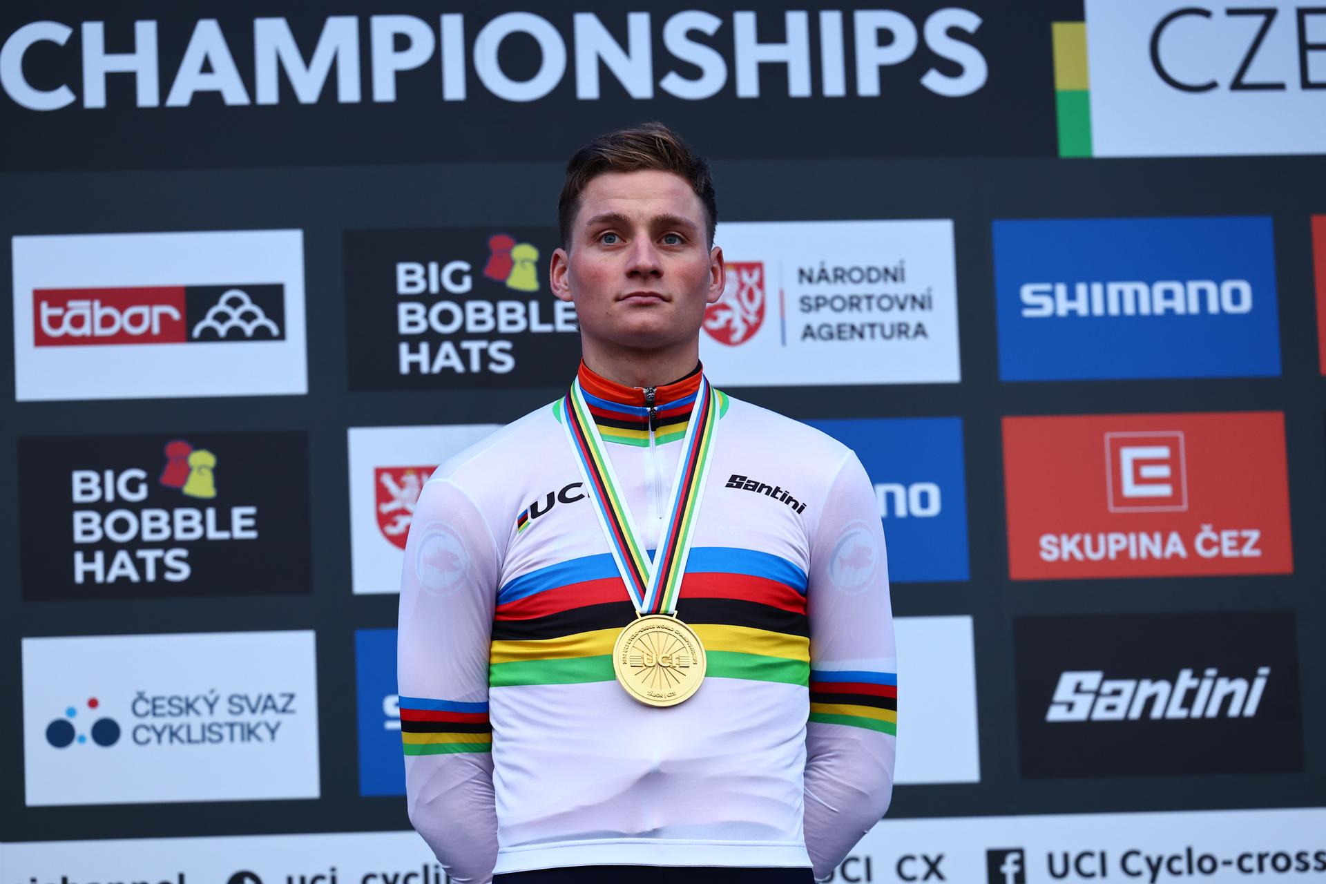 Dutch Mathieu Van Der Poel celebrates on the podium with his gold medal after the Elite men's race at the Cyclocross World Championships event on Sunday 04 February 2024  in Tabor, Czech Republic. BELGA PHOTO DAVID PINTENS