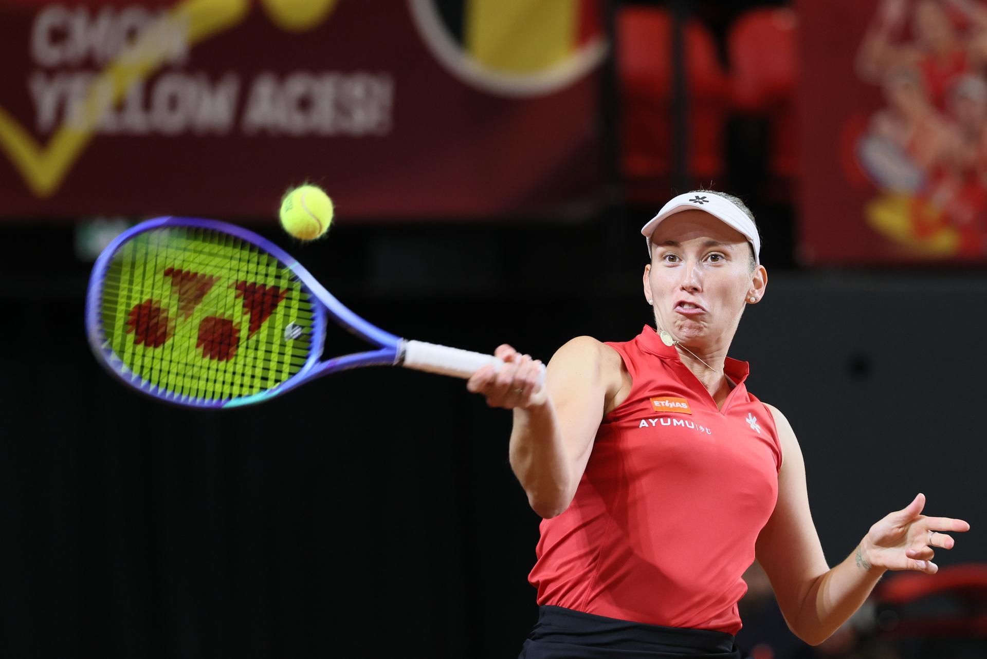 Belgian Elise Mertens pictured in action during the third game, a double game between Belgian pair Kempen/ Mertens and US pair McNally/ Melichar on the second day of the qualifiers of the Billie Jean King Cup tennis between Belgium and the USA, in Oostende, Belgium, on . The meeting takes place on 10 and 11th April. PHOTO BENOIT DOPPAGNE