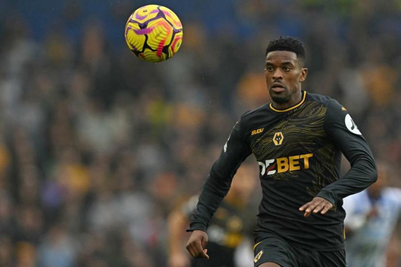 Wolverhampton Wanderers' Portuguese defender #22 Nelson Semedo chases the ball during the English Premier League football match between Brighton and Hove Albion and Wolverhampton Wanderers at the American Express Community Stadium in Brighton, southern England, on October 26, 2024.  Glyn KIRK / AFP