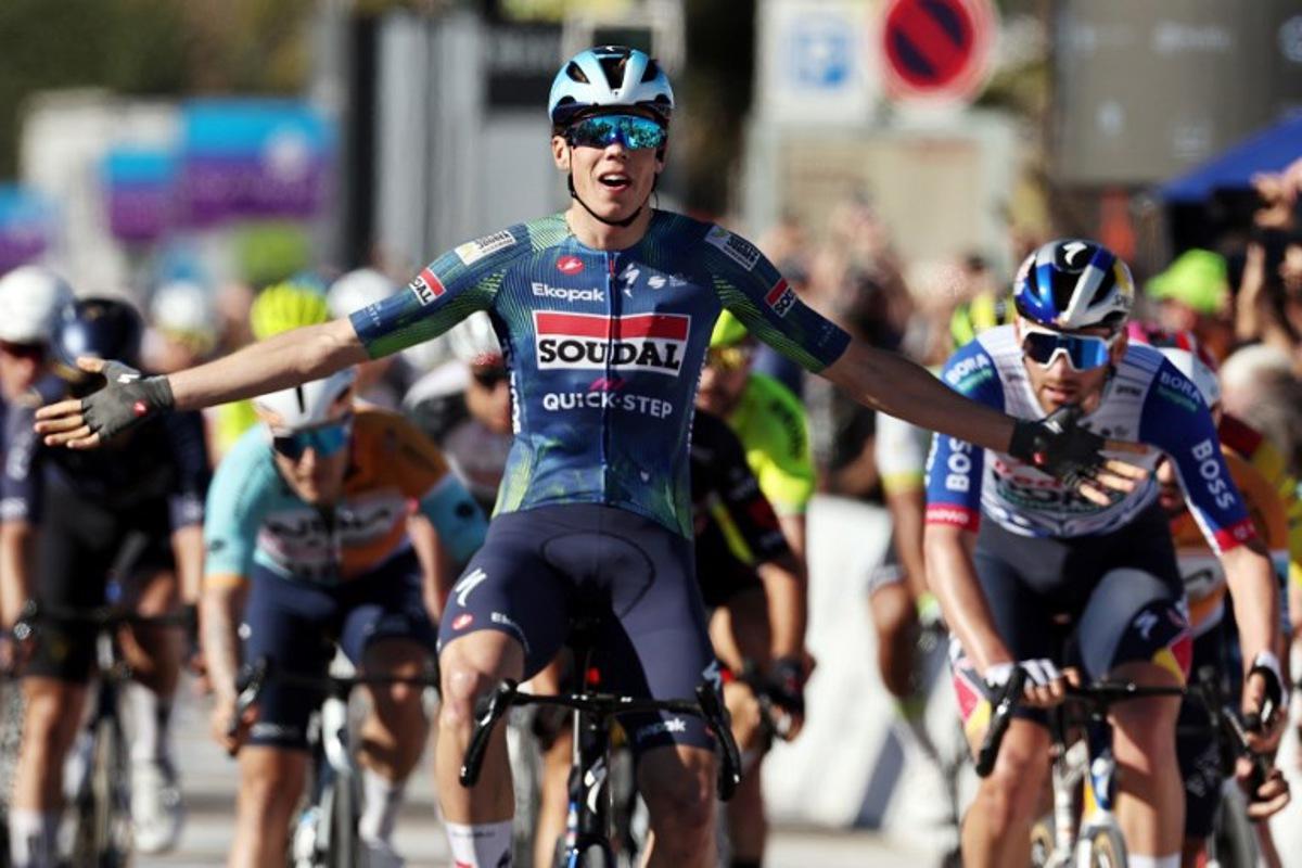 Soudal Quick-Step French cyclist Paul Magnier celebrates winning the stage four of the Algarve Tour, a 182.10 km race from Albufeira to Lagos, on February 21, 2026.  João Matos / AFP