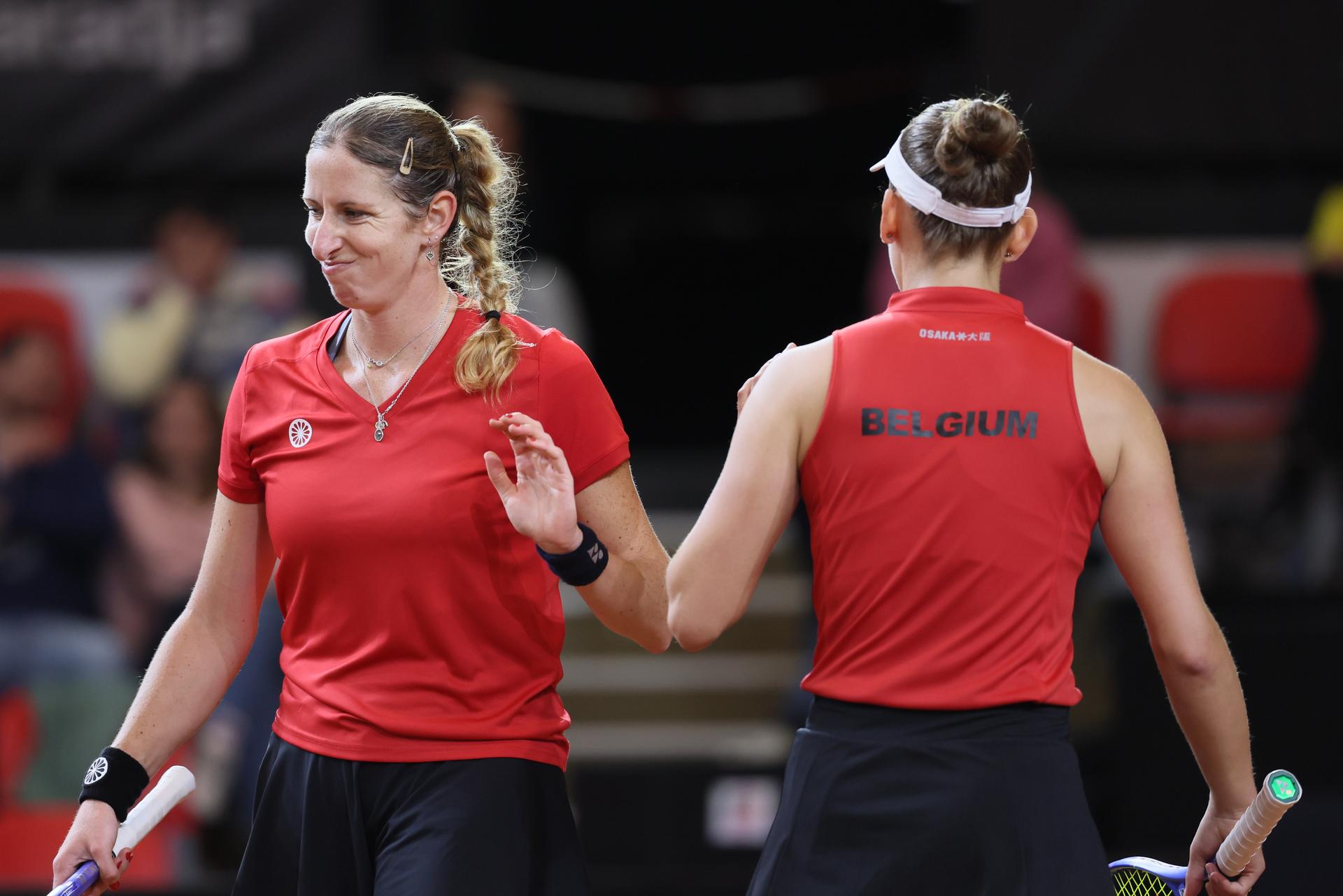 Belgian Magali Kempen and Belgian Elise Mertens pictured during the third game, a double game between Belgian pair Kempen/ Mertens and US pair McNally/ Melichar on the second day of the qualifiers of the Billie Jean King Cup tennis between Belgium and the USA, in Oostende, Belgium, on . The meeting takes place on 10 and 11th April. PHOTO BENOIT DOPPAGNE