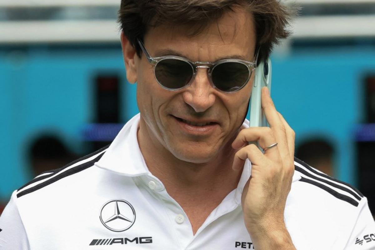 Mercedes' Austrian team principal and CEO Toto Wolff talks on the phone as he arrives for the 2025 Miami Formula One Grand Prix at Miami International Autodrome in Miami Gardens, Florida, on May 4, 2025.   CHARLY TRIBALLEAU / AFP