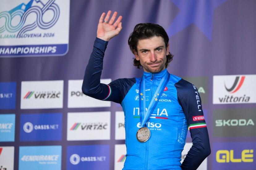 Silver medallist Italy's rider Giulio Ciccone reacts on the podium after the men's elite road race of the UEC European Road Cycling Championships in Sencur, near Ljubljana, Slovenia, on October 4, 2026.  JURE MAKOVEC / AFP