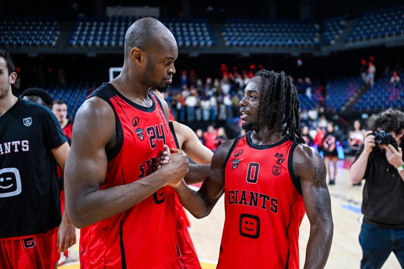 Antwerp's Kevin Tumba and Antwerp's Rasheed Bello celebrate after winning a basketball match between Antwerp Giants and Okapi Aalst, Friday 07 November 2025 in Antwerp, on day 7 of the 'BNXT League' Belgian/ Dutch first division basket championship. BELGA PHOTO TOM GOYVAERTS