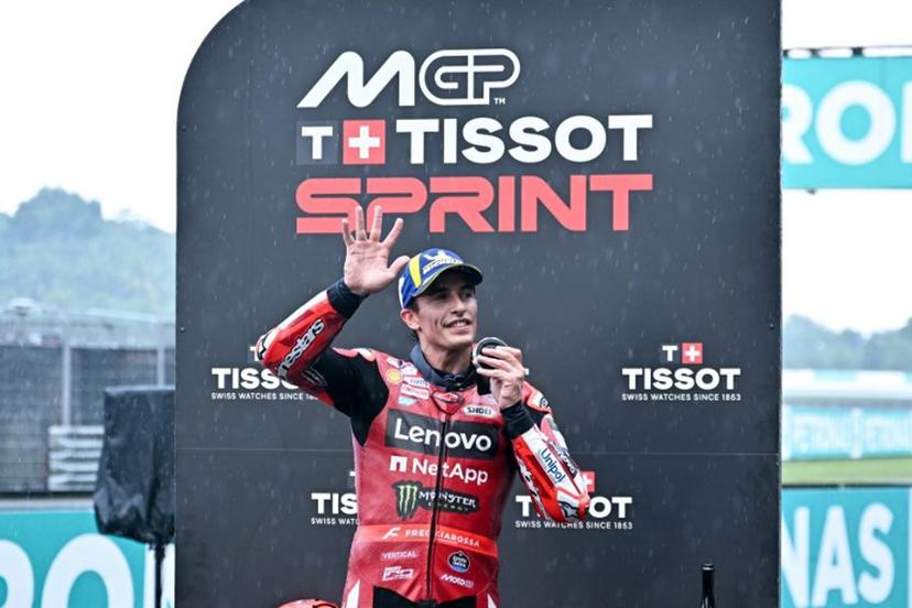 Second place Ducati Lenovo Team's Spanish rider Marc Marquez gestures on the podium of the sprint race of the MotoGP Malaysian Grand Prix at the Sepang International Circuit in Sepang on October 31, 2026.  MOHD RASFAN / AFP