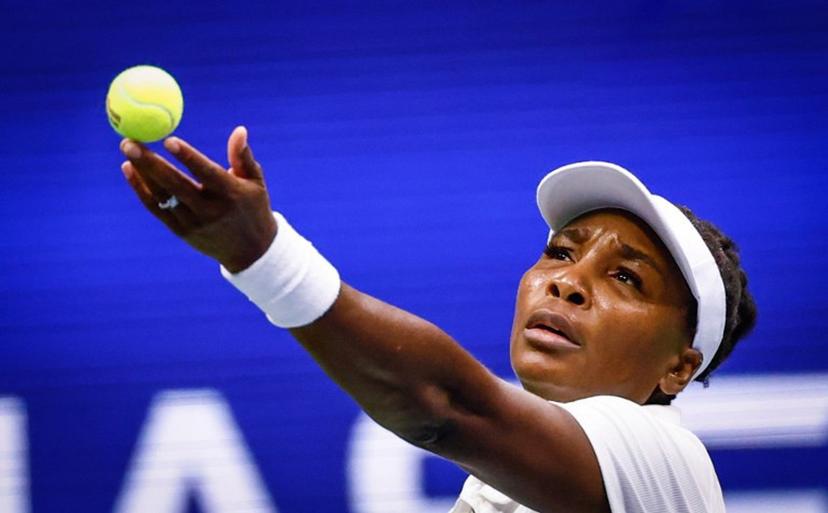 USA's Venus Williams serves the ball to Czech Republic's Karolina Muchova during their women's singles first round tennis match on day two of the US Open tennis tournament at the USTA Billie Jean King National Tennis Center in New York City, on August 25, 2025.  Kena Betancur / AFP