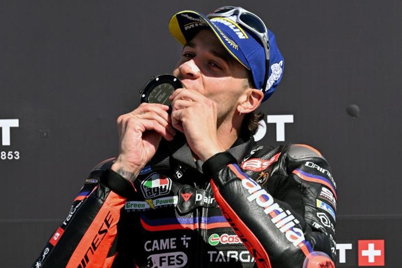 Aprilia Racing team's Italian MotoGP rider Marco Bezzecchi celebrates winning the MotoGP sprint race at the MotoGP Australian Grand Prix on Philip Island on October 18, 2025.  William WEST / AFP