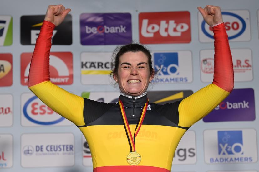 Belgian Marion Norbert Riberolle celebrates on the podium with the Belgian champion jersey after the Women elite race at the Belgian Cyclocross Championships in Beringen on Saturday 10 January 2026. BELGA PHOTO DAVID PINTENS