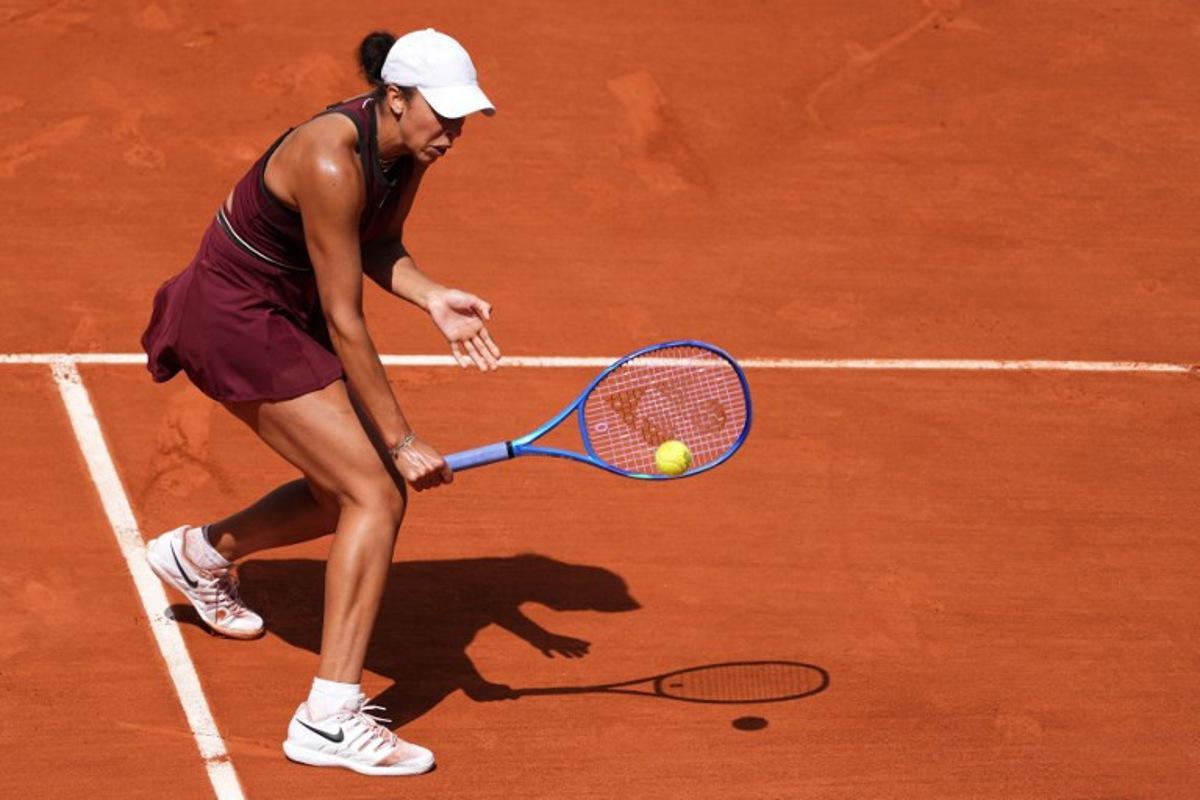 US Madison Keys plays a backhand return to US Hailey Baptiste during their women's singles match on day 9 of the French Open tennis tournament on Court Suzanne-Lenglen at the Roland-Garros Complex in Paris on June 2, 2025.  Dimitar DILKOFF / AFP