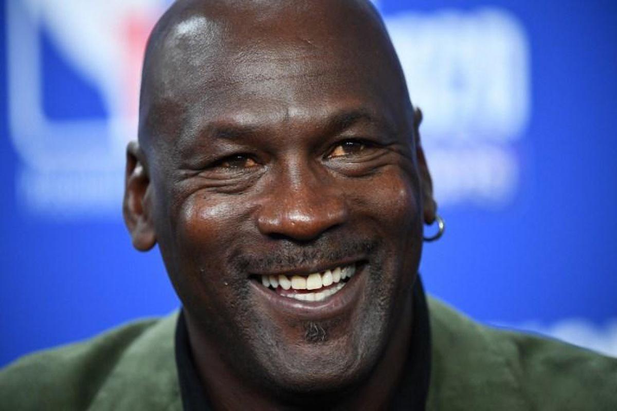 Former NBA star and owner of Charlotte Hornets team Michael Jordan looks on as he addresses a press conference ahead of the NBA basketball match between Milwaukee Bucks and Charlotte Hornets at The AccorHotels Arena in Paris on January 24, 2020.   FRANCK FIFE / AFP