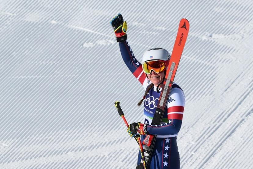 US' Breezy Johnson reacts in the finish area of the women's downhill event during the Milano Cortina 2026 Winter Olympic Games at the Tofane Alpine Skiing Centre in Cortina d'Ampezzo on February 8, 2026.  Marco BERTORELLO / AFP