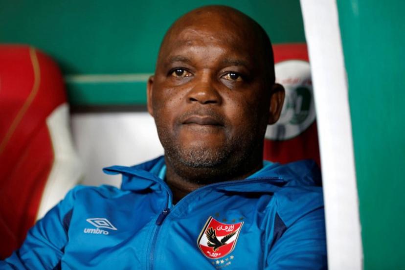 Ahly's South African coach Pitso Mosimane looks on during the CAF Champions League Semi-Final between Algeria's ES Setif and Egypt's al-Ahly at the 5 July stadium in the Algiers suburb of Ben Aknoun on May 14, 2022.  AFP