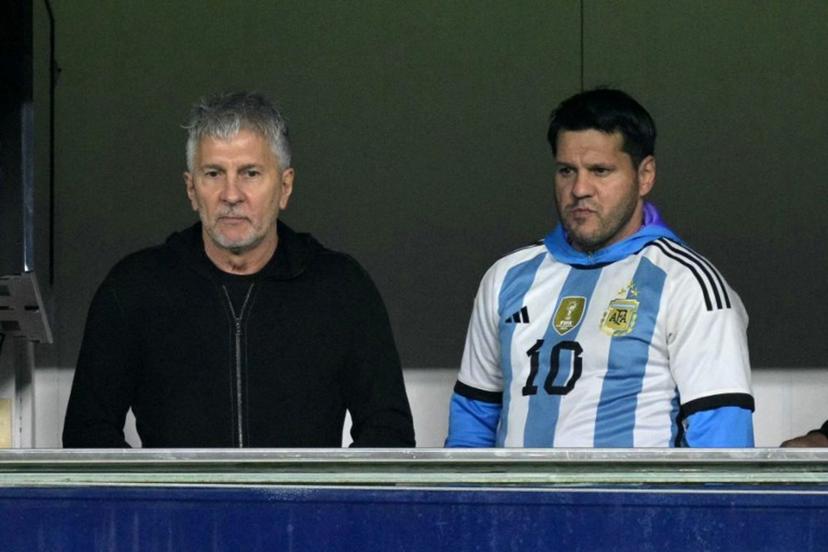 Argentina's forward Lionel Messi's father, Jorge Messi (L), and brother Rodrigo wait for the start of the 2026 FIFA World Cup South American qualifiers football match between Argentina and Peru at the La Bombonera stadium in Buenos Aires on November 19, 2024.  JUAN MABROMATA / AFP