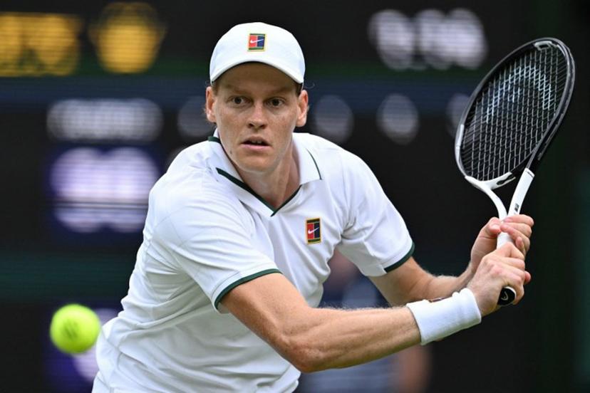 Italy's Jannik Sinner returns against Portugal's Nuno Borges during their men's singles second round tennis match on the third day of the 2026 Wimbledon Championships at The All England Lawn Tennis and Croquet Club in Wimbledon, southwest London, on July 1, 2026.  Kirill KUDRYAVTSEV / AFP