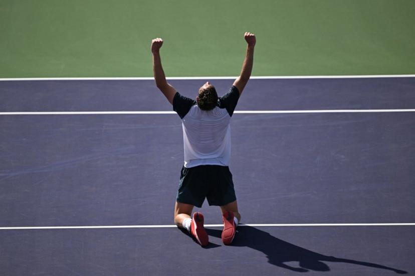 Britain's Jack Draper celebrates after defeating Denmark's Holger Rune during the men's singles final tennis match at the BNP Paribas Open at the Indian Wells Tennis Garden in Indian Wells, California, on March 16, 2025.  Patrick T. Fallon / AFP
