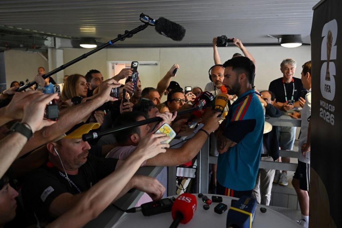 Spain's midfielder #15 Alex Baena gives an MD-1 press conference at the Dallas Stadium in Arlington on July 13, 2026, on the eve of the 2026 World Cup football tournament semi-final match between France and Spain.  MAURO PIMENTEL / AFP