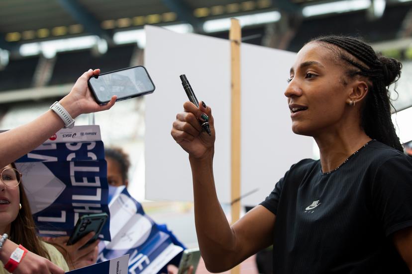 Belgian Nafissatou Nafi Thiam and fans pictured during the Belgian athletics championships, Sunday 03 August 2025 in Brussels. The Belgian championships take place from 2-3 August, 2025. BELGA PHOTO KRISTOF VAN ACCOM