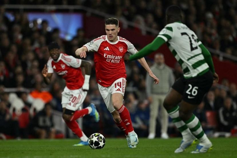 Arsenal's Swedish striker #14 Viktor Gyokeres runs with the ball during the UEFA Champions League quarter-final, second-leg football match between Arsenal and Sporting Lisbon at the Emirates Stadium in north London on April 15, 2026.  Ben STANSALL / AFP