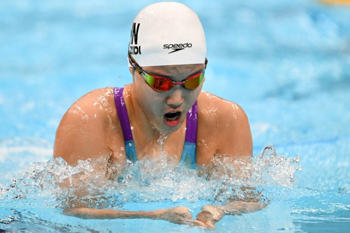 China's Yu Zidi competes in the final of the women's 200m individual medley swimming event during the 2026 Asian Games at the Tokyo Aquatics Centre in Tokyo on September 21, 2026.  ANDREW CABALLERO-REYNOLDS / AFP