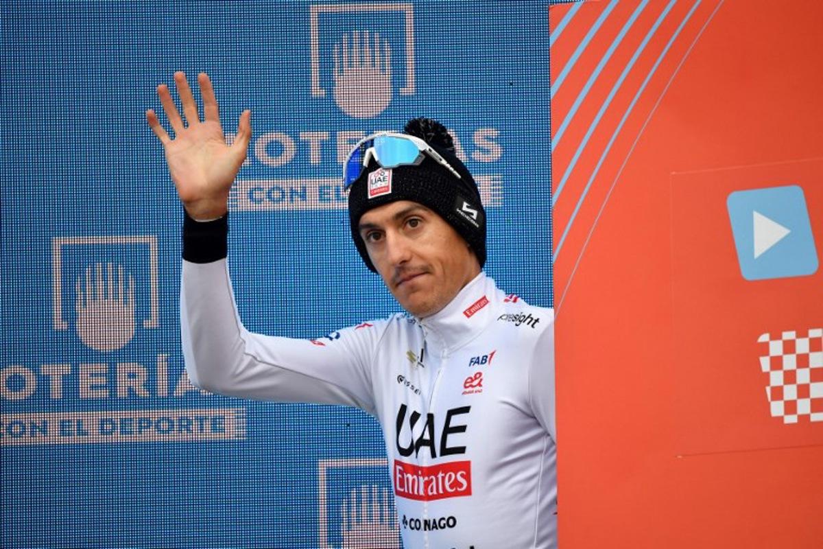 Team UAE's Marc Soler celebrates arrives on the podium after the stage 18 of the Vuelta a Espana, a 179,5 km race between Vitoria-Gasteiz and Maeztu, on September 5, 2024.    Ander Gillenea / AFP