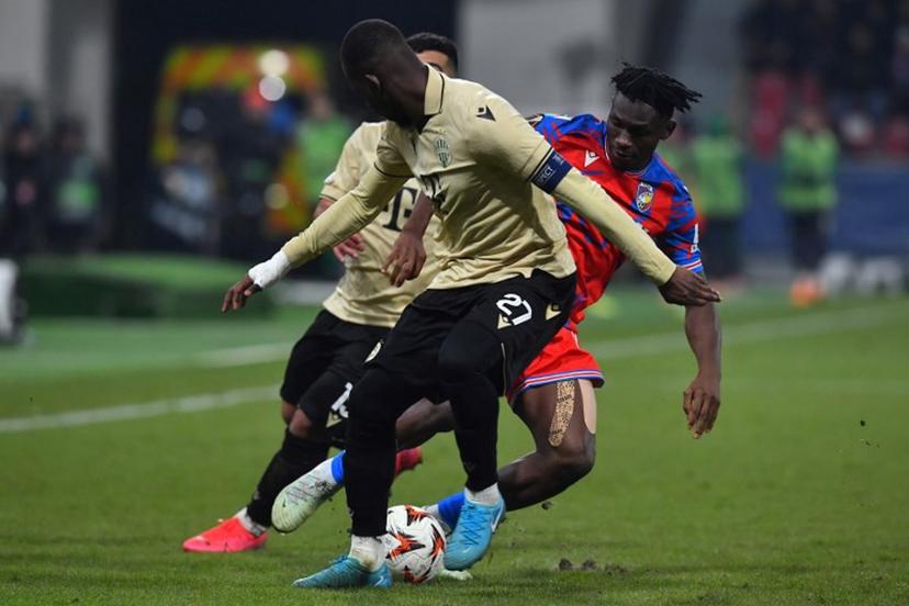 Ferencvaros' French defender #27 Ibrahim Cisse (L) and Viktoria Plzen's Ghanaian forward #80 Prince Kwabena Abu (R) vie for the ball during the UEFA Europa League knockout round play-off 2nd leg football match between FC Viktoria Plzen and Ferencvaros in Plzen, Czech Republic, on February 20, 2025.  Michal Cizek / AFP