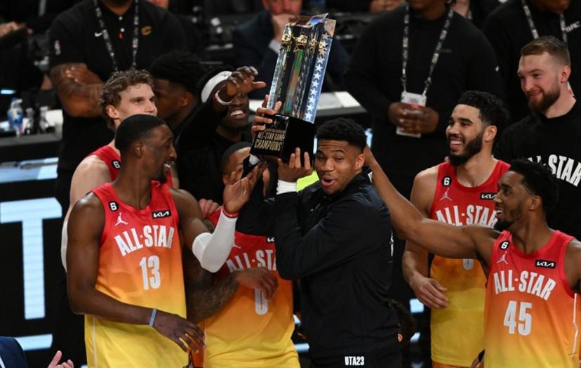 Milwaukee Bucks' Giannis Antetokounmpo lift the trophy after his team won the NBA All-Star game between Team Giannis and Team LeBron at the Vivint arena in Salt Lake City, Utah, February 19, 2023.   Patrick T. Fallon / AFP