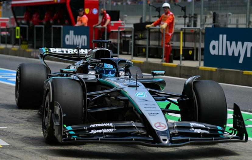 Mercedes' British driver George Russell drives to the start of the first practice session at the Red Bull Ring race track in Spielberg, Austria, on June 27, 2025, ahead of the Formula One Austrian Grand Prix.   Andrej ISAKOVIC / AFP