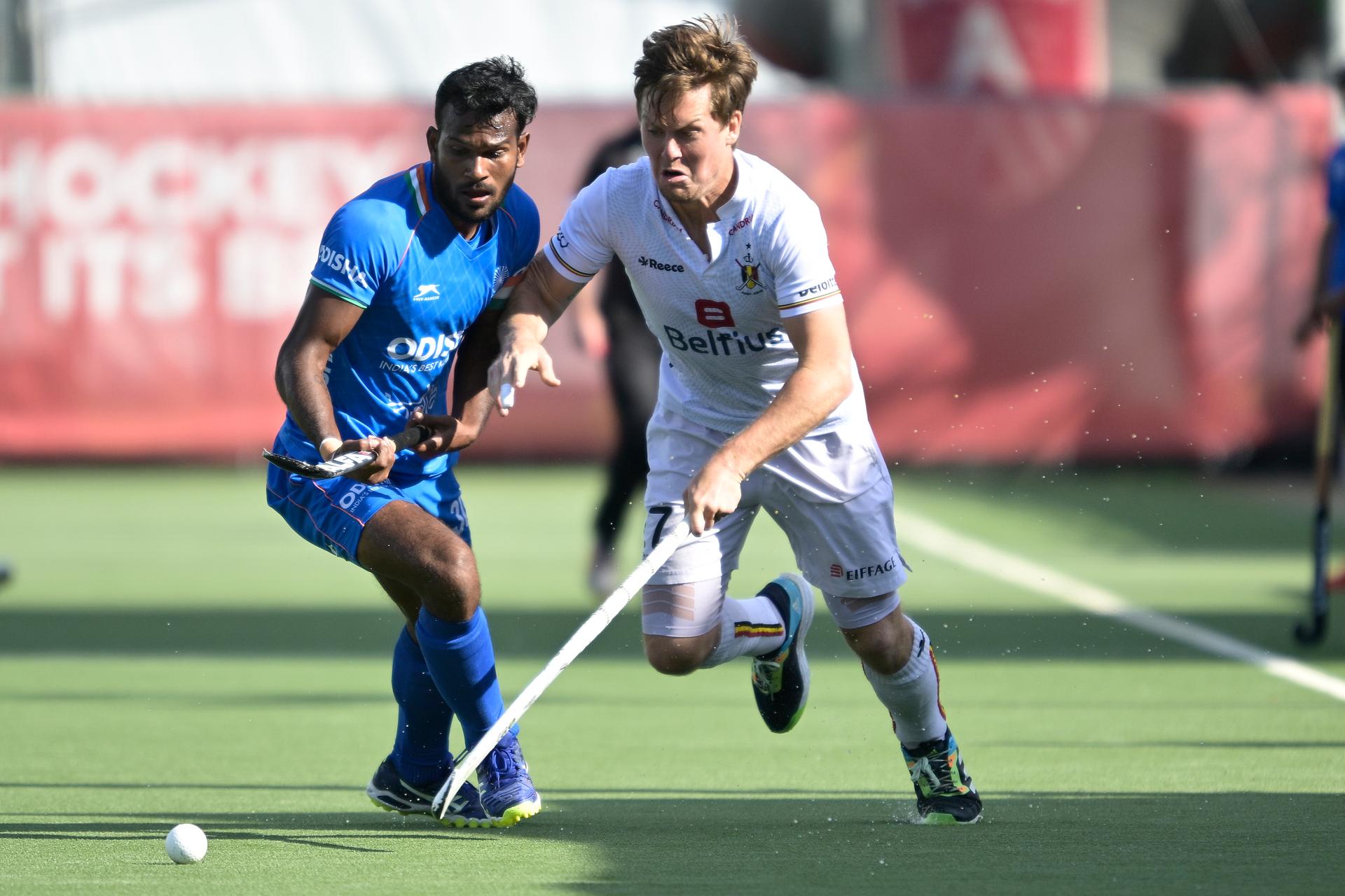 India's Amit Rohidas and Belgium's Tom Boon fight for the ball during a hockey match between the Belgian Red Lions and India in the group stage (game 14 out of 16) of the Men's FIH Pro League competition, Sunday 12 June 2022 in Wilrijk, Antwerp. BELGA PHOTO JOHAN EYCKENS