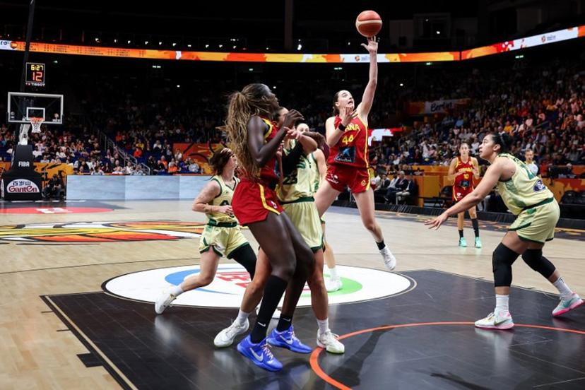 Australia's center #22 Zitina Aokuso (R) and Spain's point guard #44 Iyana Martin (C) vie for the ball during the 2026 FIBA Women's Basketball World Cup quarter-final match between Australia and Spain at the Berlin Arena in Berlin on September 10, 2026.  Ronny HARTMANN / AFP