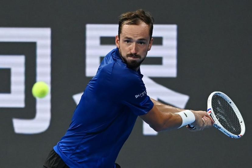 Russia's Daniil Medvedev hits a return to Russia's Roman Safiullin during their men's singles semi-final match at the Hangzhou Open tennis tournament in Hangzhou, in China's eastern Zhejiang province on September 28, 2026.  AFP
