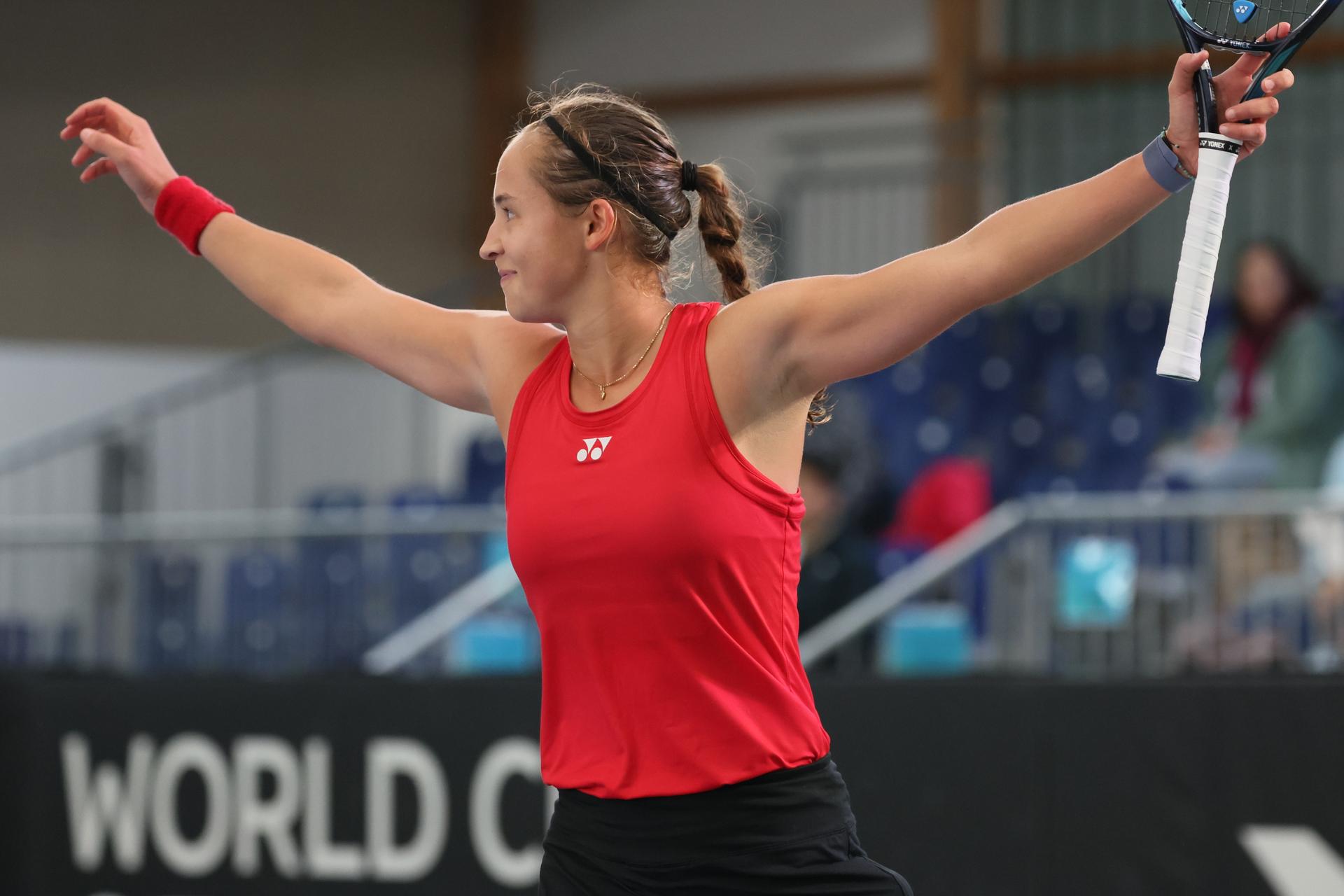 Belgian Hanne Vandewinkel celebrates after winning the second game between Belgian Vandewinkel and Turkish Sonmez in the Billie Jean King Cup Play-offs, between Belgium and Turkey, on Saturday 15 November 2025 in Ismaning, Germany. PHOTO BENOIT DOPPAGNE