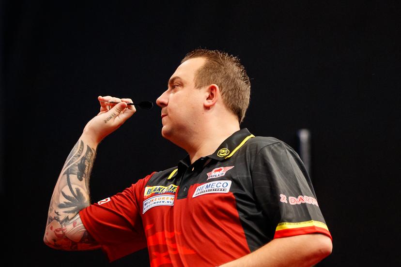 Belgian Kim Huybrechts pictured in action during the third day of the Belgian Darts Open, Sunday 25 September 2022 in Wieze, a tournament in the European Tour that takes places from September 23 until September 25. BELGA PHOTO JEF MATTHEE