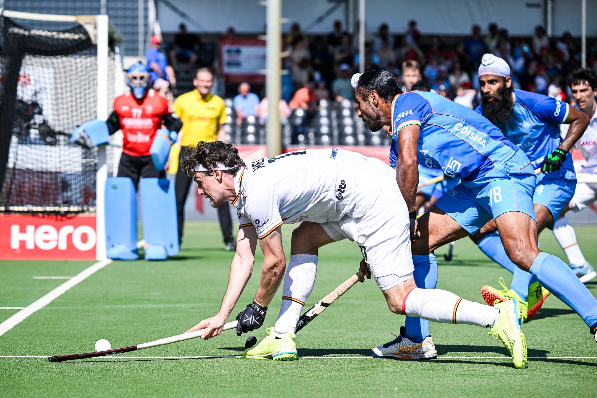 Belgium's Guillaume Hellin and India's Nilakanta Sharma pictured in action during a hockey game between Belgian national team Red Lions and India, match 13/16 in the group stage of the 2025 Men's FIH Pro League, Saturday 21 June 2025 in Antwerp. BELGA PHOTO TOM GOYVAERTS