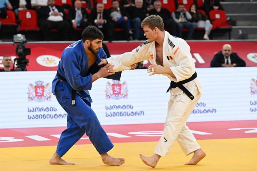 Belgium's Matthias Casse (white) competes against Georgia's Dimitri Gochilaidze in the men's under 81 kg bronze medal bout at the Tbilisi Grand Slam judo tournament in Tbilisi on March 21, 2026.  Vano SHLAMOV / AFP