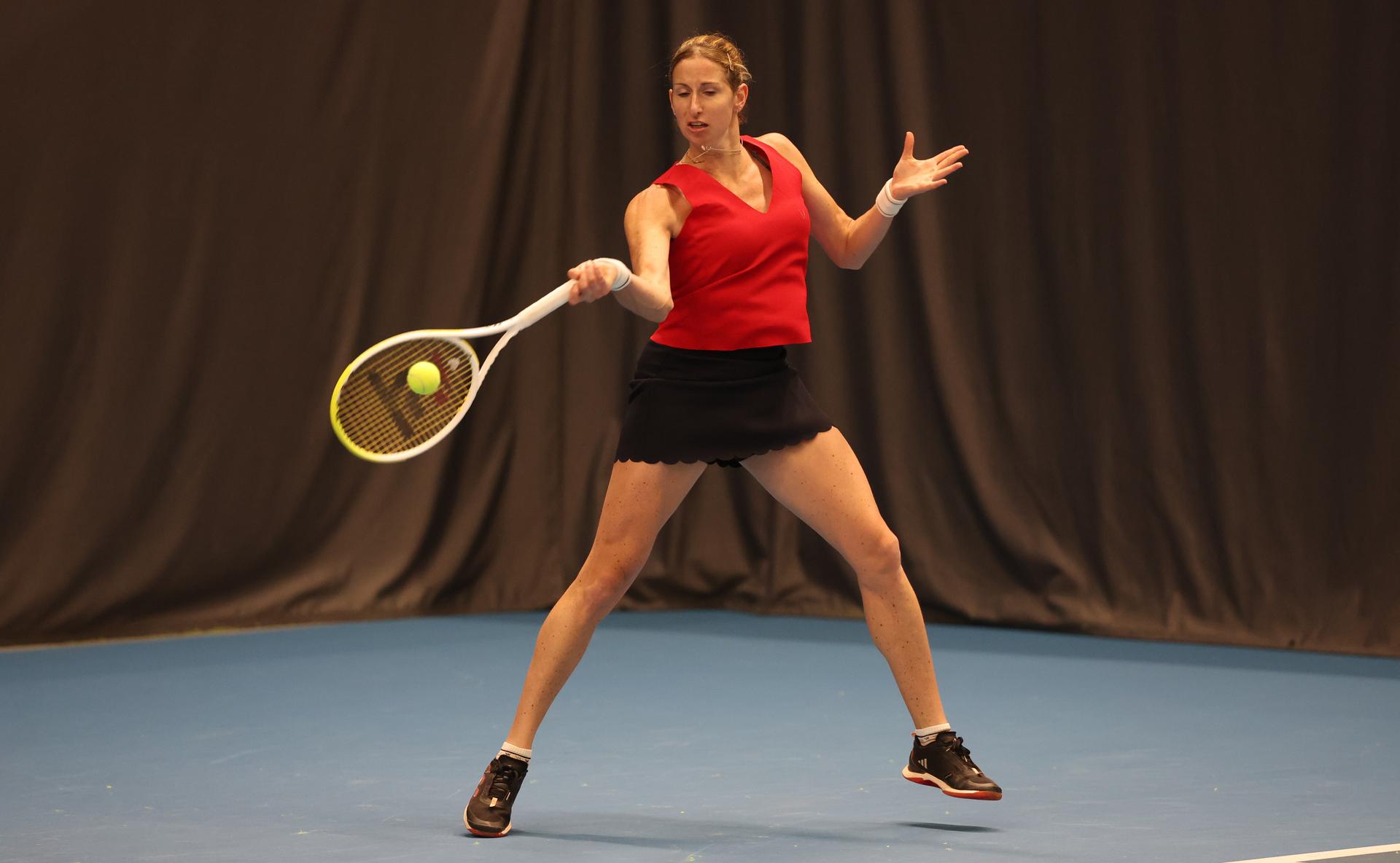 Belgian Magali Kempen pictured in action during a double tennis match between Belgians Belgian Costoulas/Kempen and Greeks Christofi/Pavlou, in the qualifiers of the Billie Jean King Cup tennis, in Vilnius, Lithuania on Tuesday 08 April 2025. PHOTO VIRGINIE LEFOUR