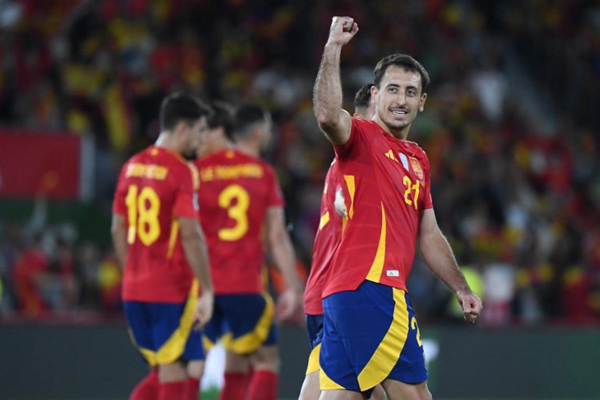 Spain's forward #21 Mikel Oyarzabal celebrates scoring his team's second goal during the 2026 World Cup qualifier Europe zone group E football match between Spain and Georgia at Manuel Martinez Valero stadium in Elche on October 11, 2025.  Jose Jordan / AFP