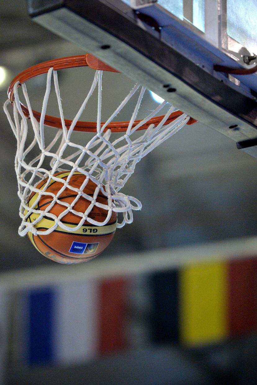 20150319 - VILLENEUVE-D'ASCQ, FRANCE: Illustration picture shows a ball going through the ring at the first leg match of the Fiba Eurocup women final between French Villeneuve d'Ascq and Belgian Castors Braine, Thursday 19 March 2015, in Villeneuve d'Ascq, France. BELGA PHOTO DAVID STOCKMAN