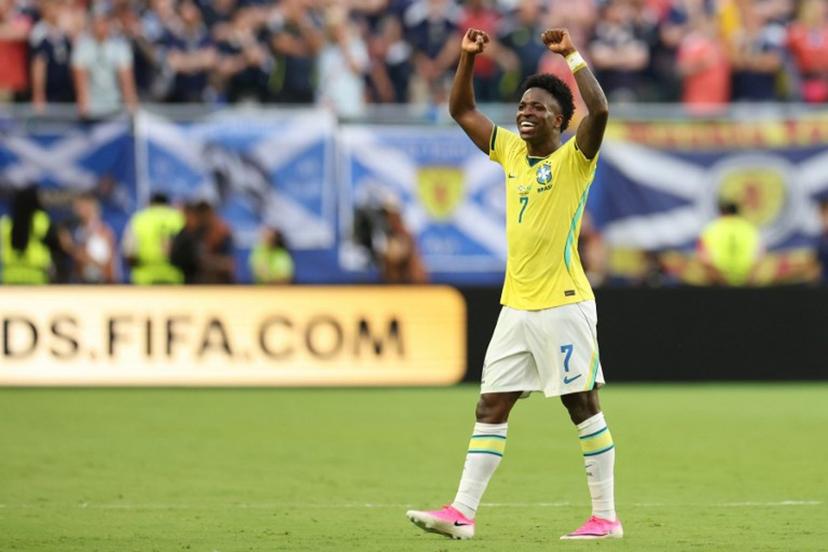 Brazil's forward #07 Vinicius Junior celebrates after scoring his team's second goal during the 2026 World Cup Group C football match between Scotland and Brazil at the Miami Stadium in Miami Gardens on June 24, 2026.   PATRICIA DE MELO MOREIRA / AFP