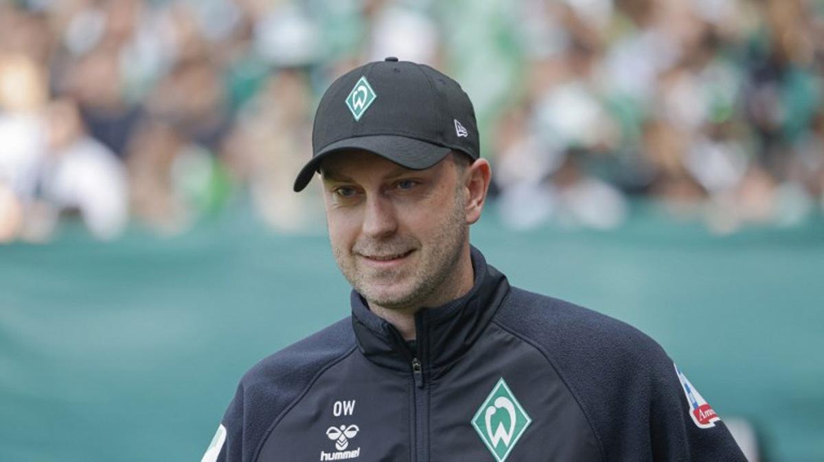 Bremen's German head coach Ole Werner head coach Zsolt Loew is seen prior to the start of the German first division Bundesliga football match between SV Werder Bremen and RB Leipzig in Bremen, northern Germany on May 10, 2025.  Focke Strangmann / AFP