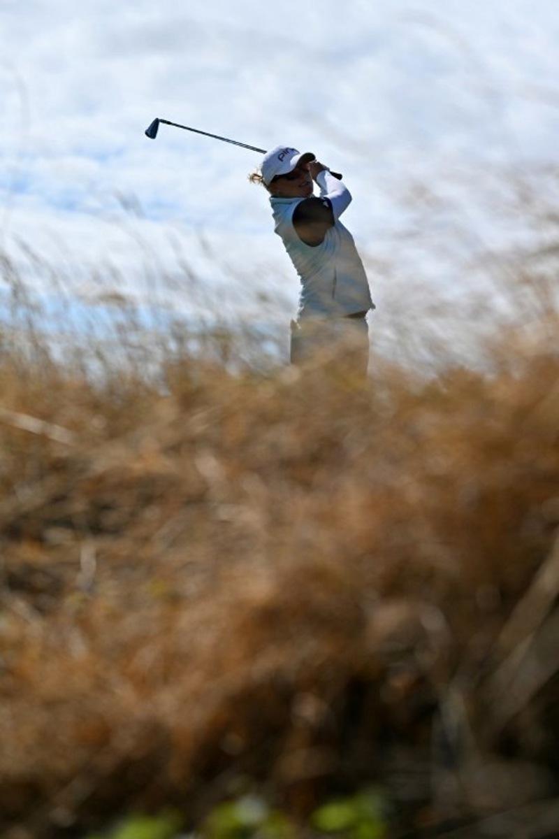 Belgium's Manon De Roey watches a drive from the 4th tee on the first day of the 2026 Women's British Open Golf Championships at Royal Lytham & St. Annes Golf Club, north-west England, on July 30, 2026.   Glyn KIRK / AFP