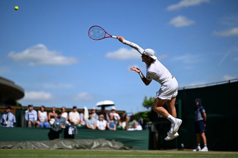 Belgium's Zizou Bergs serves against Britain's Arthur Fery during their men's singles third round tennis match on the sixth day of the 2026 Wimbledon Championships at The All England Lawn Tennis and Croquet Club in Wimbledon, southwest London, on July 4, 2026.  Kirill KUDRYAVTSEV / AFP