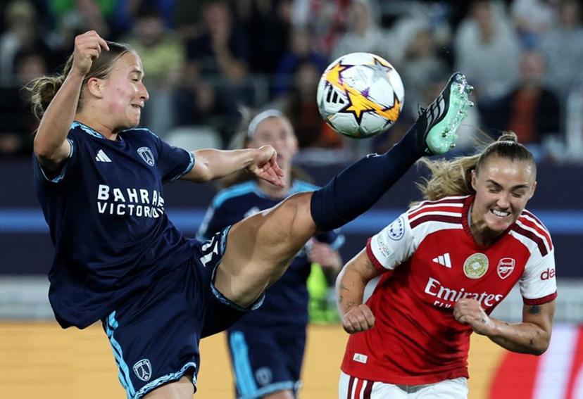 Paris FC's French defender #19 Thea Gheboval (L) and Arsenal's English midfielder #04 Georgia Stanway (r) fight for the ball during the UEFA Women's Champions League league phase Matchday 2 football match between Paris FC and Arsenal WFC at the Jean-Bouin Stadium in Paris on September 30, 2026.  FRANCK FIFE / AFP
