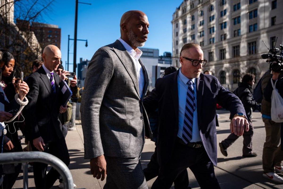 Chauncey Billups, NBA head coach for the Portland Trailblazers, exits Brooklyn Federal Court on November 24, 2025 in New York City.  Billups pleaded not guilty Monday to alleged involvement in Mafia-linked illegal gambling schemes that rocked the NBA, prosecutors said. Billups, a former Detroit Pistons star and  NBA Hall of Famer, was arrested in connection with rigged illegal poker games tied to Mafia crime families.  Angelina Katsanis / AFP