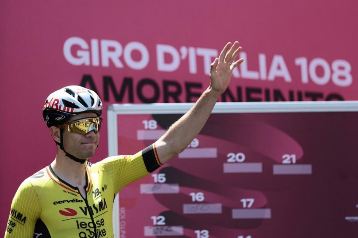 Team Visma-Lease a Bike's Belgian rider Wout Van Aert waves before the start of the 18th stage of the 108th Giro d'Italia cycling race of 144kms from Morbegno to Cesano Maderno on May 29, 2025.  Luca Bettini / AFP