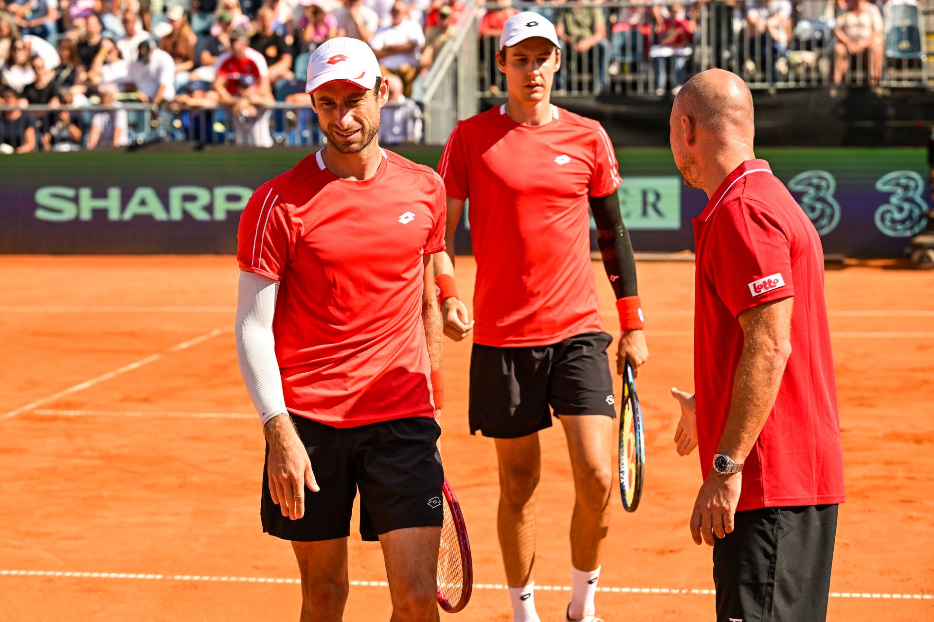 Belgian Joran Vliegen; Belgian Sander Gille and Belgian captain Steve Darcis are pictured during a tennis match between Austrian pair Miedler/Oberleitner and Belgian pair Gille/ Vliegen, the third rubber in the tie between Austria and Belgium, qualifiers for the Davis Cup tournament, on Saturday 19 September 2026 in Vienna, Austria. BELGA PHOTO DAVID PINTENS
