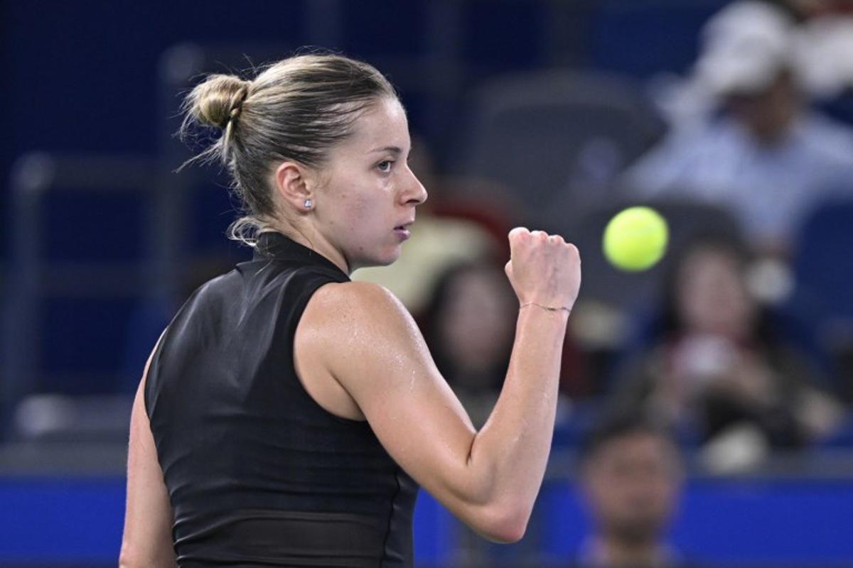Poland's Maja Chwalinska reacts after a point during her women's singles semi-final match against Poland's Iga Swiatek at the Wuhan Open tennis tournament in Wuhan, China's Hubei province on October 17, 2026.  WANG Zhao / AFP