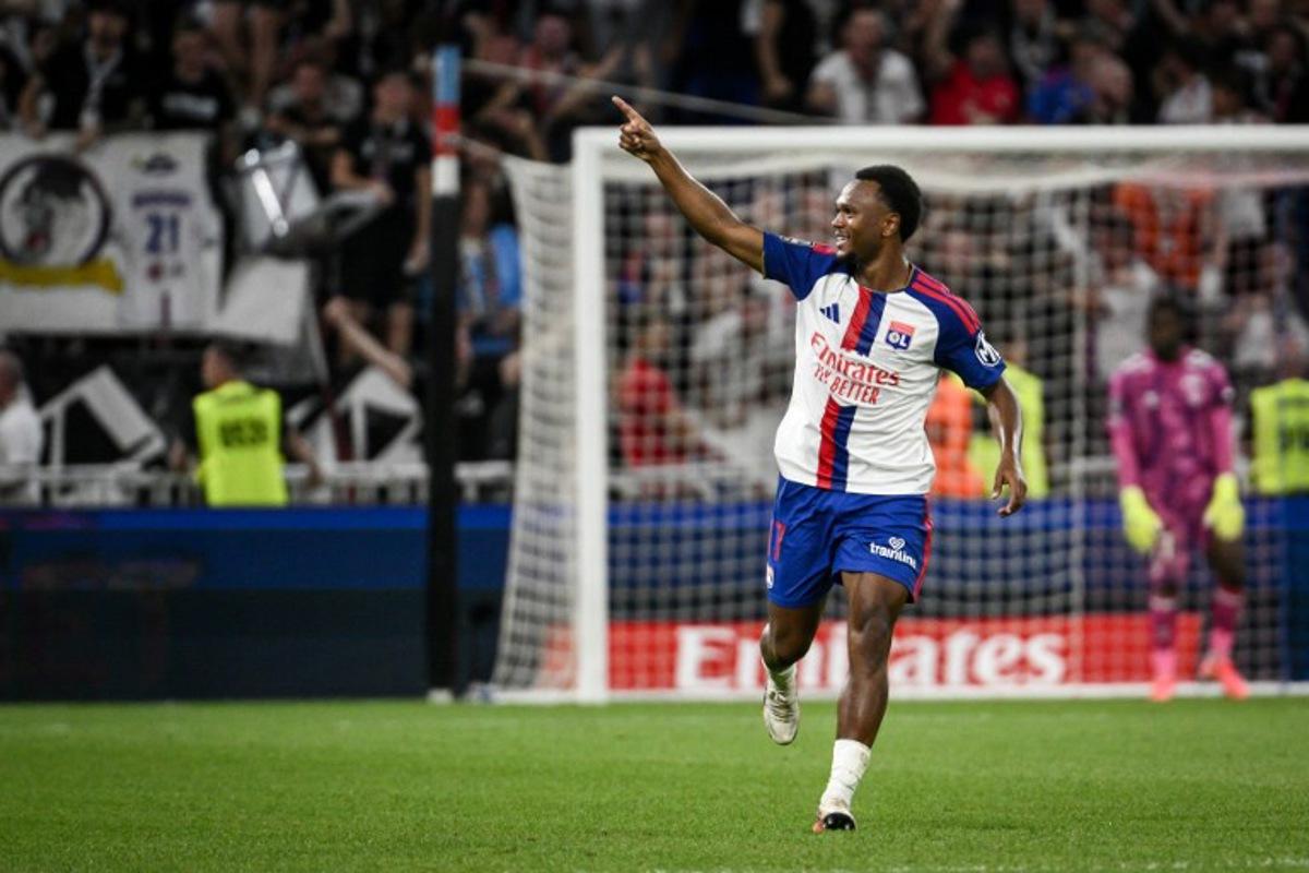 Lyon's Belgian forward #17 Lois Openda celebrates after scoring his team's first goal during the French L1 football match between Olympique Lyonnais (OL) and Le Havre AC (HAC) at the Groupama Stadium in Decines-Charpieu, central-eastern France on August 29, 2026.  ARNAUD FINISTRE / AFP