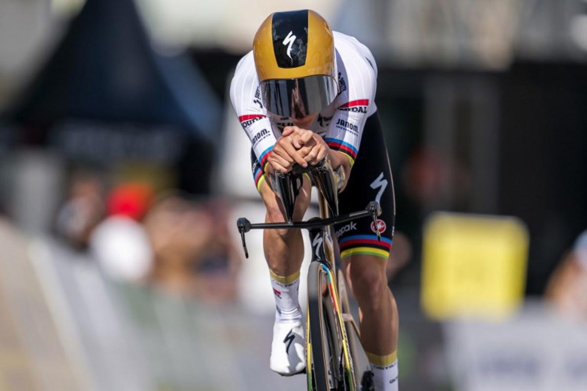 Belgium's Remco Evenepoel (Quick-Step) competes in the prologue of the Tour of Romandie UCI cycling World tour, a 3.4 km time trial from Saint-Imier to Saint-Imier, on April 29, 2025.  Fabrice COFFRINI / AFP